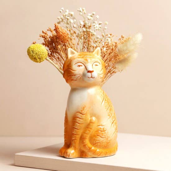 Tigger the orange cat vase by Lisa Angel, a ceramic cat-shaped vase with a speckled finish