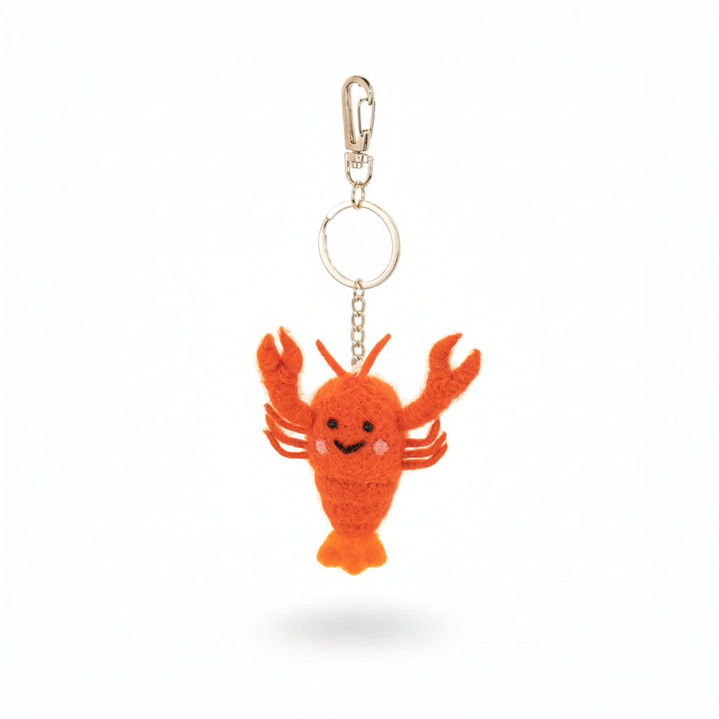Close-up of red wool felt lobster keyring showing crafted details