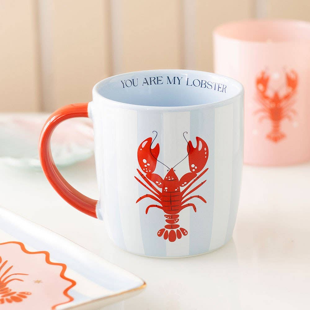 Blue and white striped coastal mug with lobster design