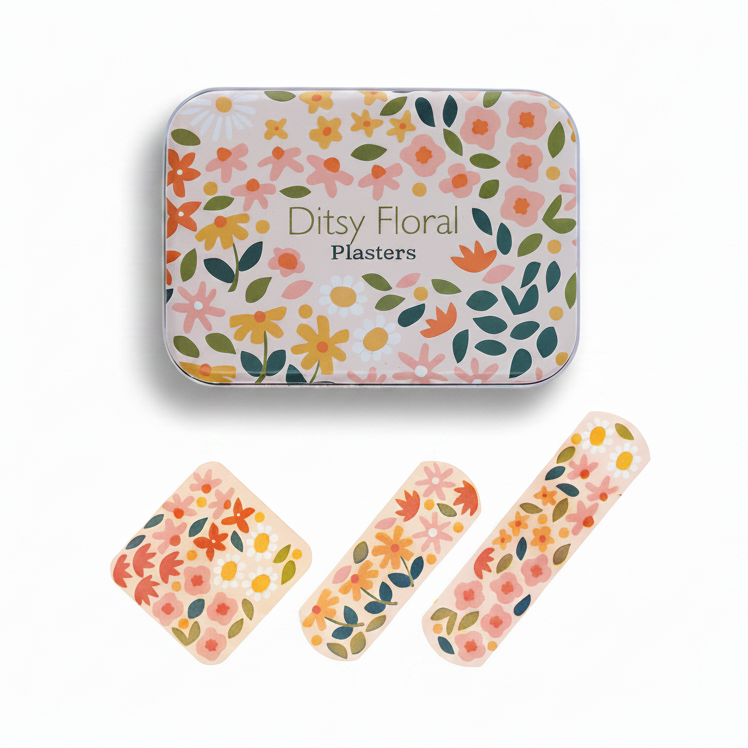 Ditsy Floral Plasters set shown with a rectangular tin and three individual square bandages, all decorated with a colorful floral pattern on a white background.