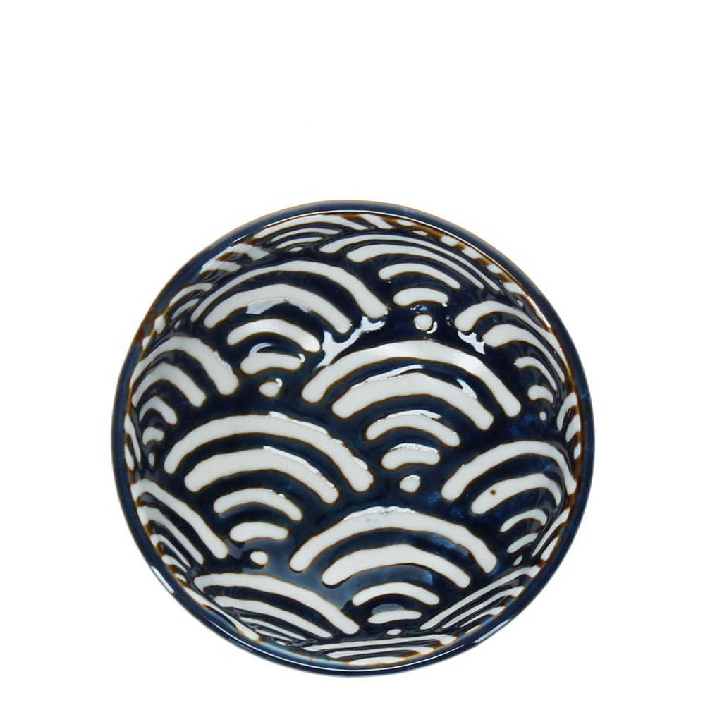 Blue round ceramic dipping bowl, wave detail, on white background.