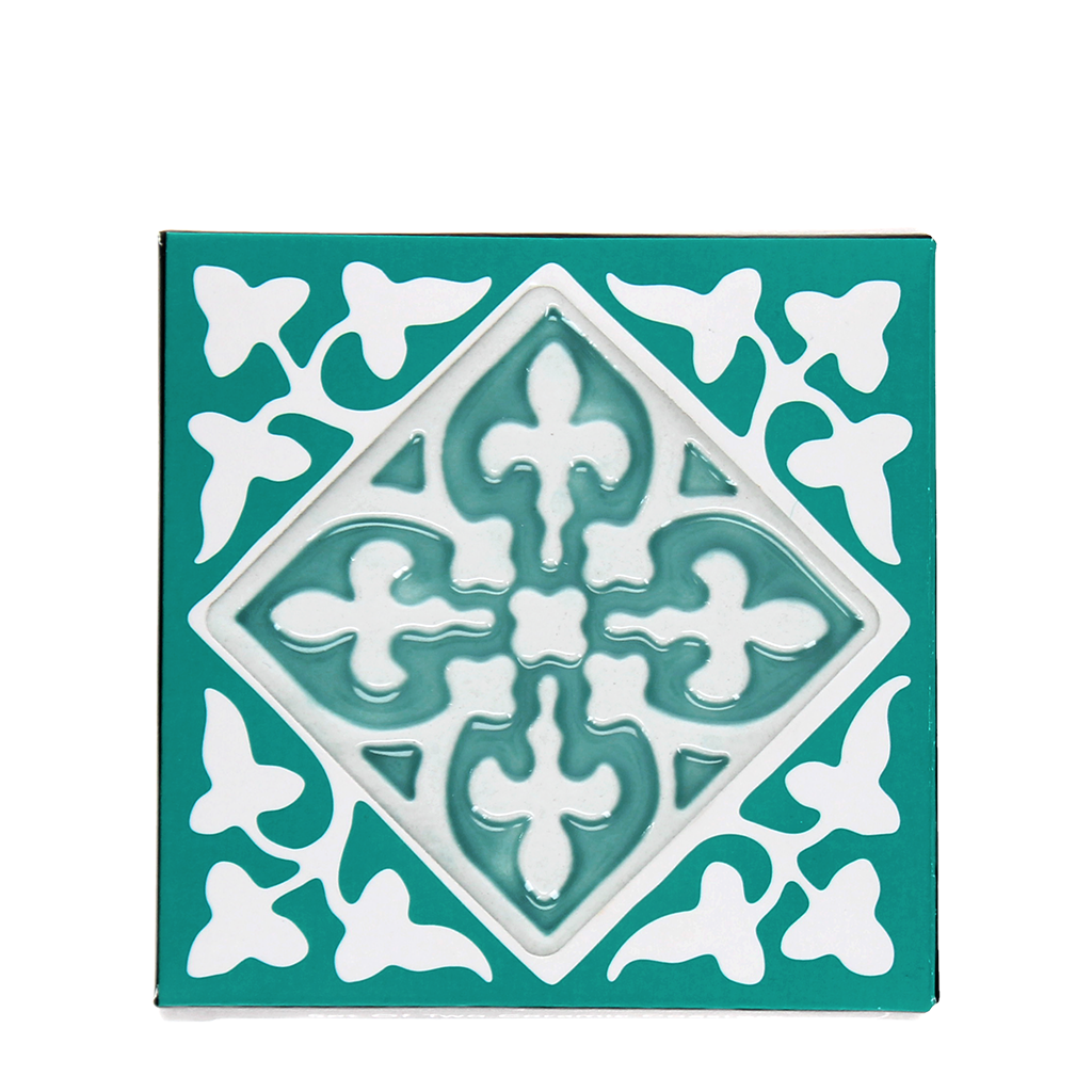 Single turquoise embossed tile coaster with ornate white pattern.