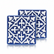 Navy ceramic tile coasters with white embossed pattern, set of two.
