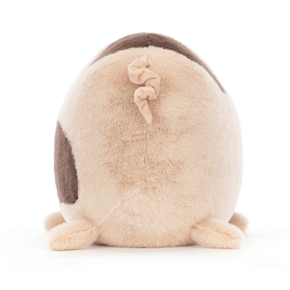 Back view of Higgledy Piggledy Old Spot Huge with curled tail and fluffy texture.