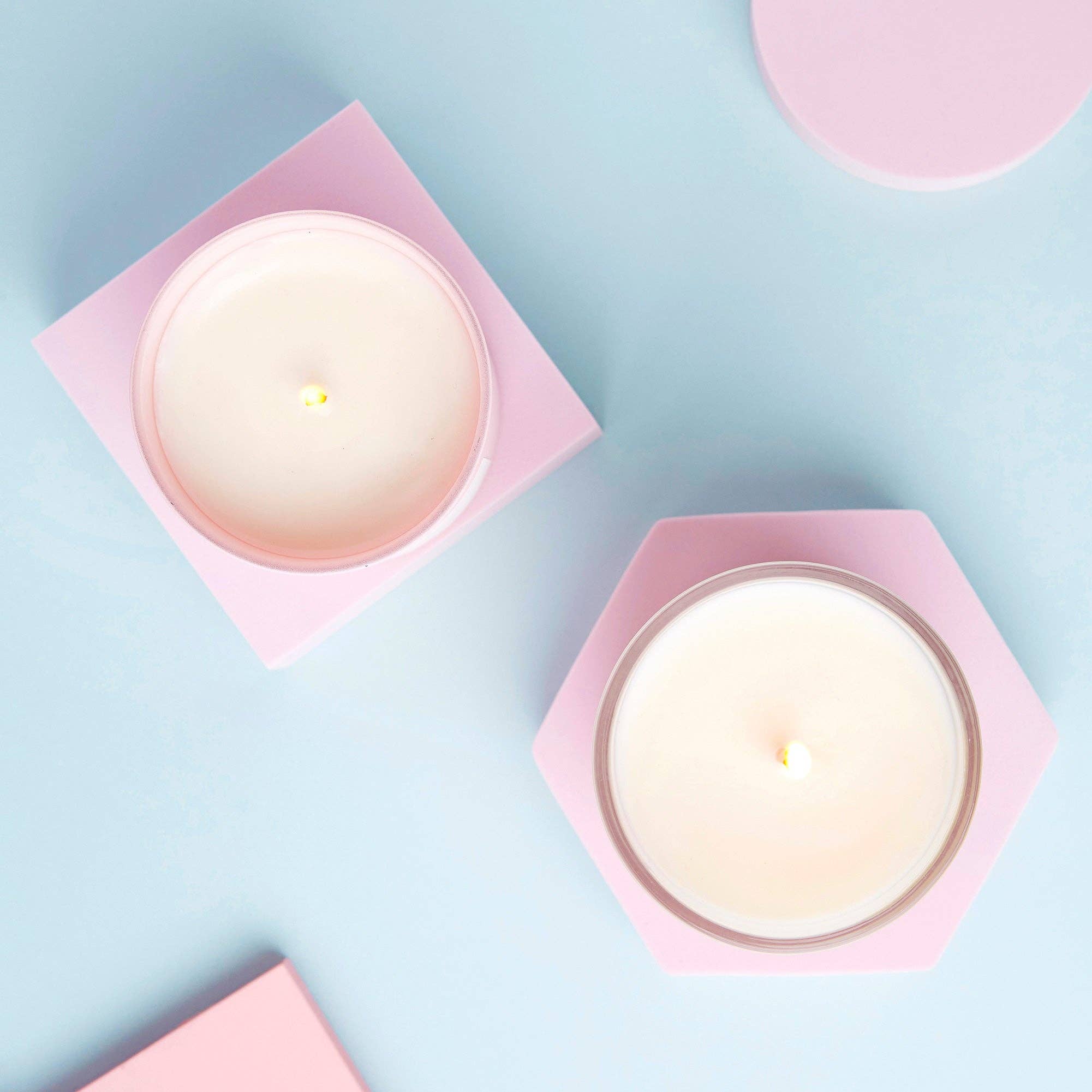 Mischief Candles range showing multiple pink candles on blue background