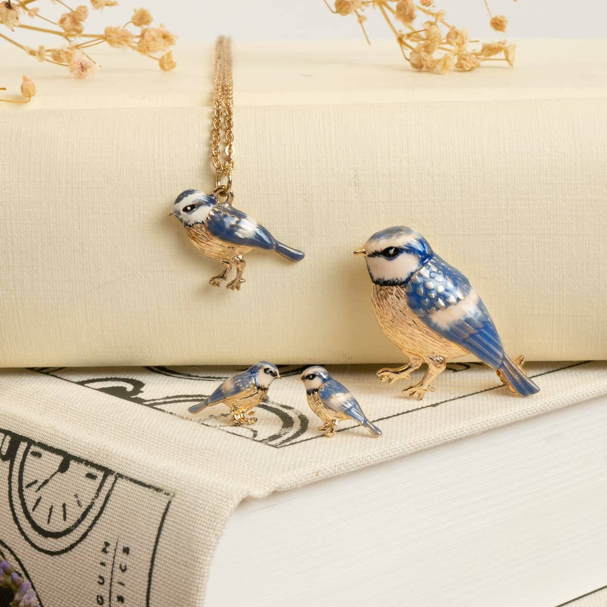 Gold-plated blue tit stud earrings, product shot from another angle