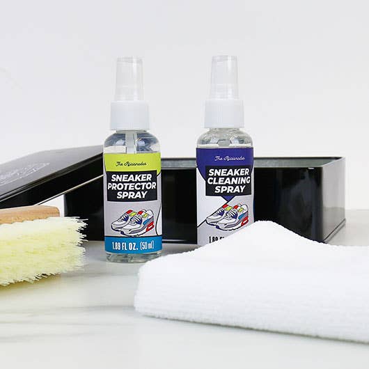 Sneaker care kit contents, two spray bottles, brush and white cloth