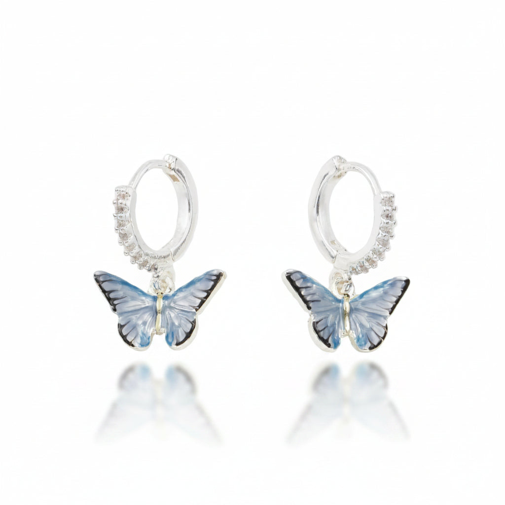 Butterfly earrings shown on branded display card packaging