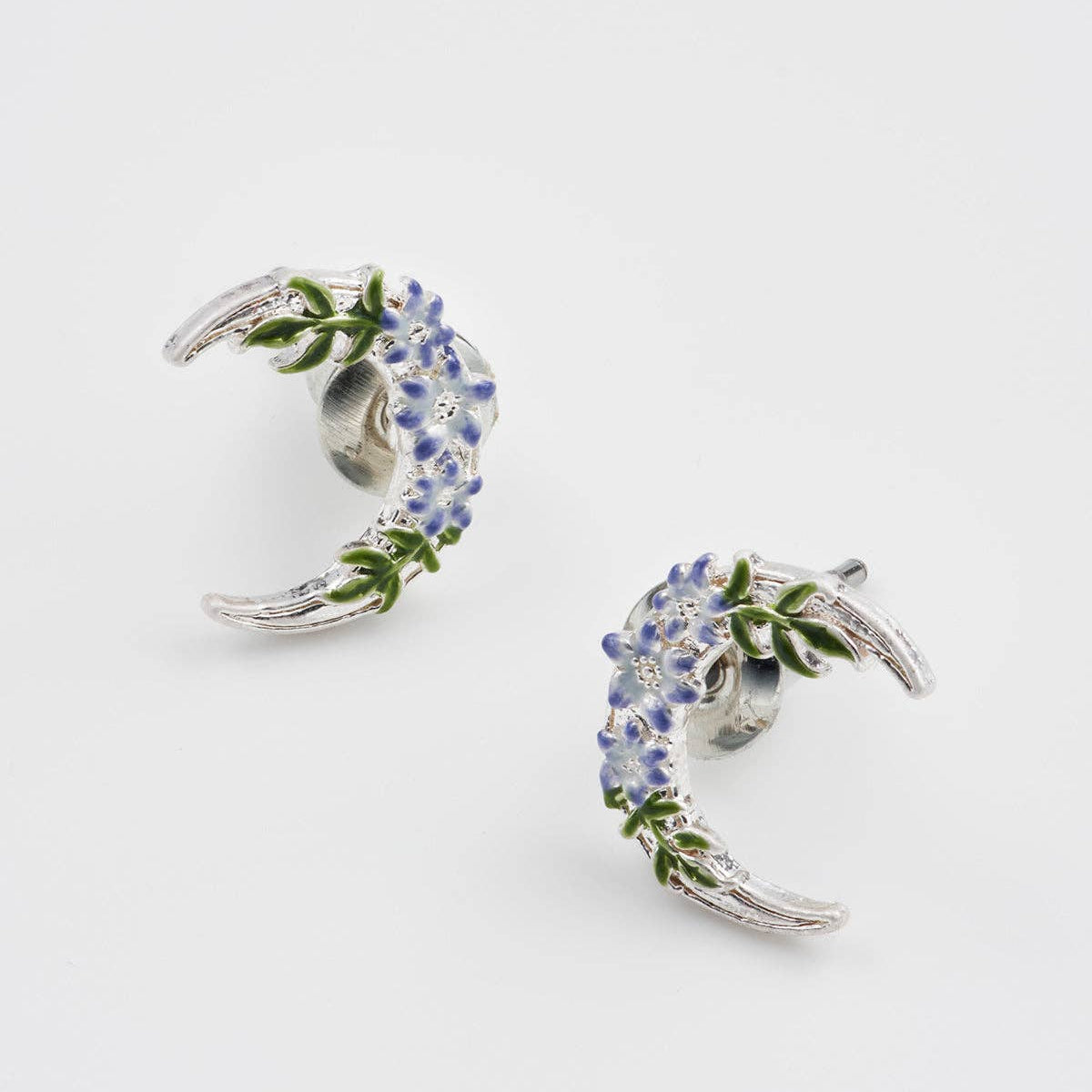 Nightshade Moon silver stud earrings, close-up product photograph