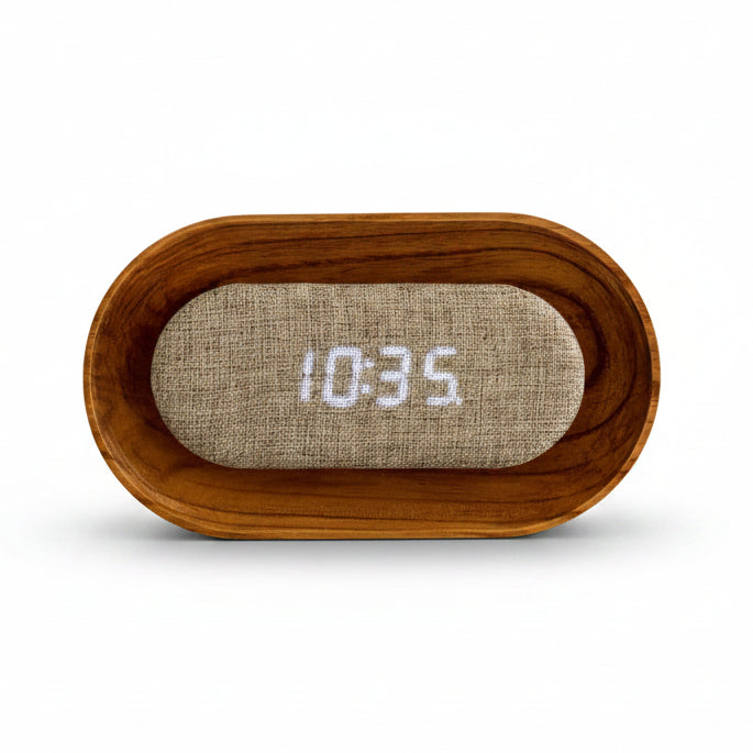 Lumos walnut clock unlit showing linen face on white shelf