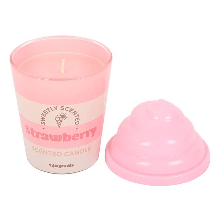 Strawberry ice cream candle with lid off showing pink wax and wick