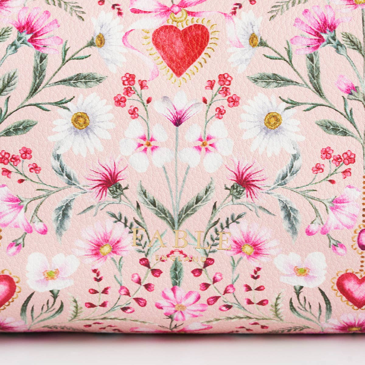 Close-up of the pebbled faux leather and floral print