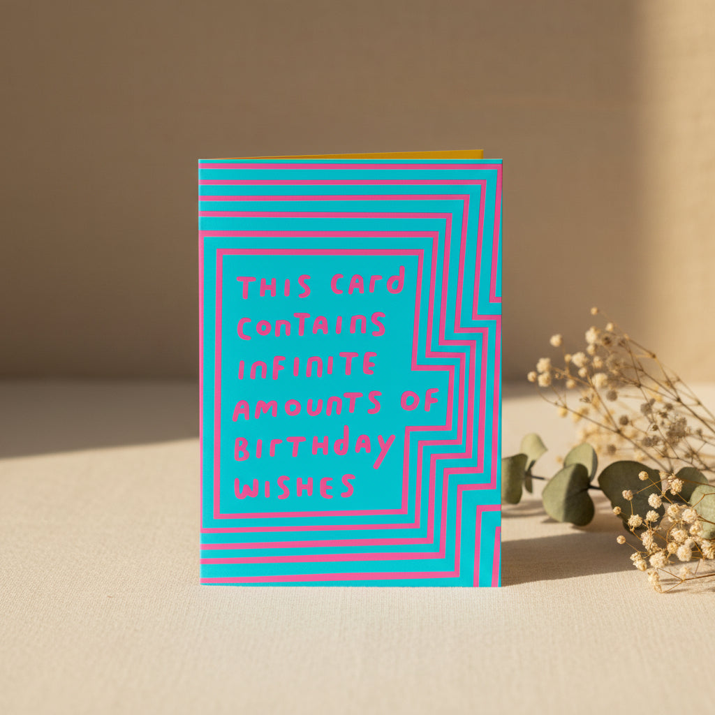 Greeting card with blue and pink text on a white background