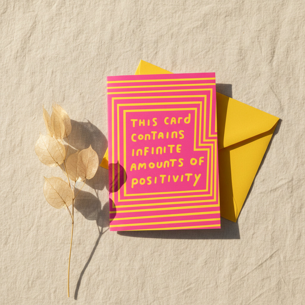 Card with pink and yellow design and text on a white background
