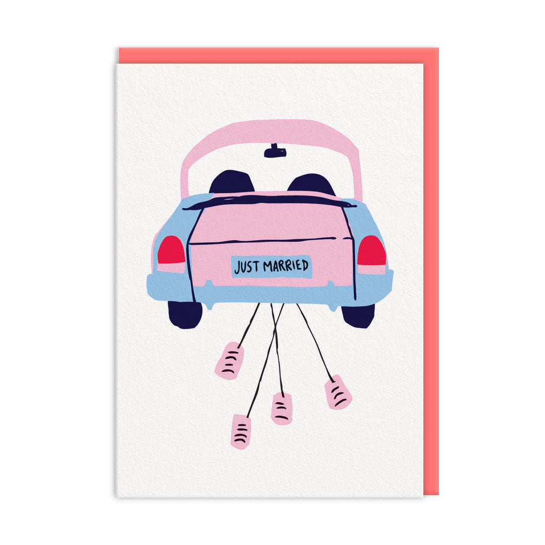 White wedding card with illustrated getaway car trailing tin cans behind