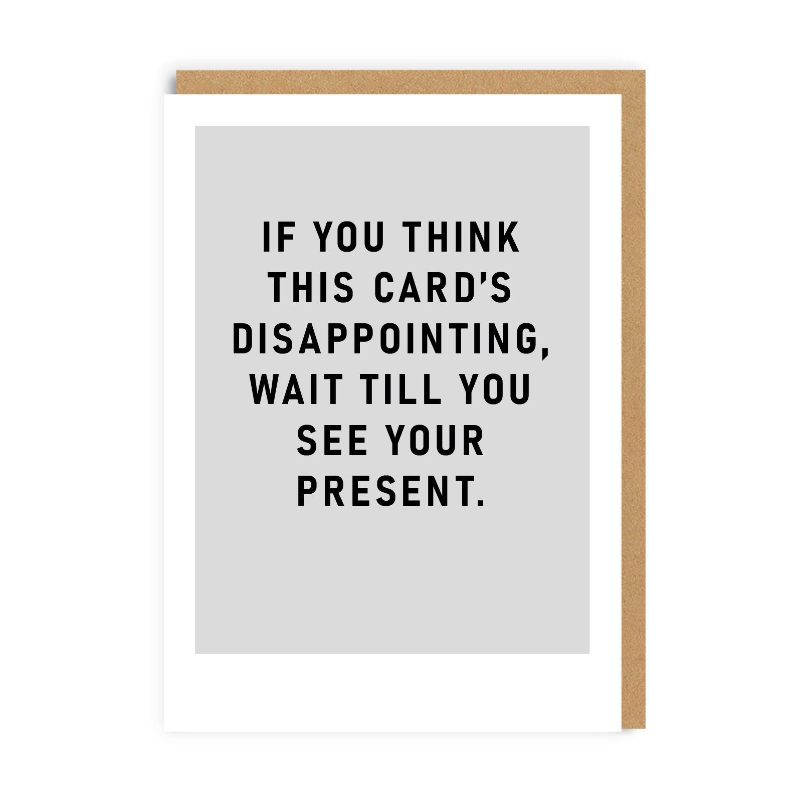 Grey greeting card joking that the present will be worse than the card