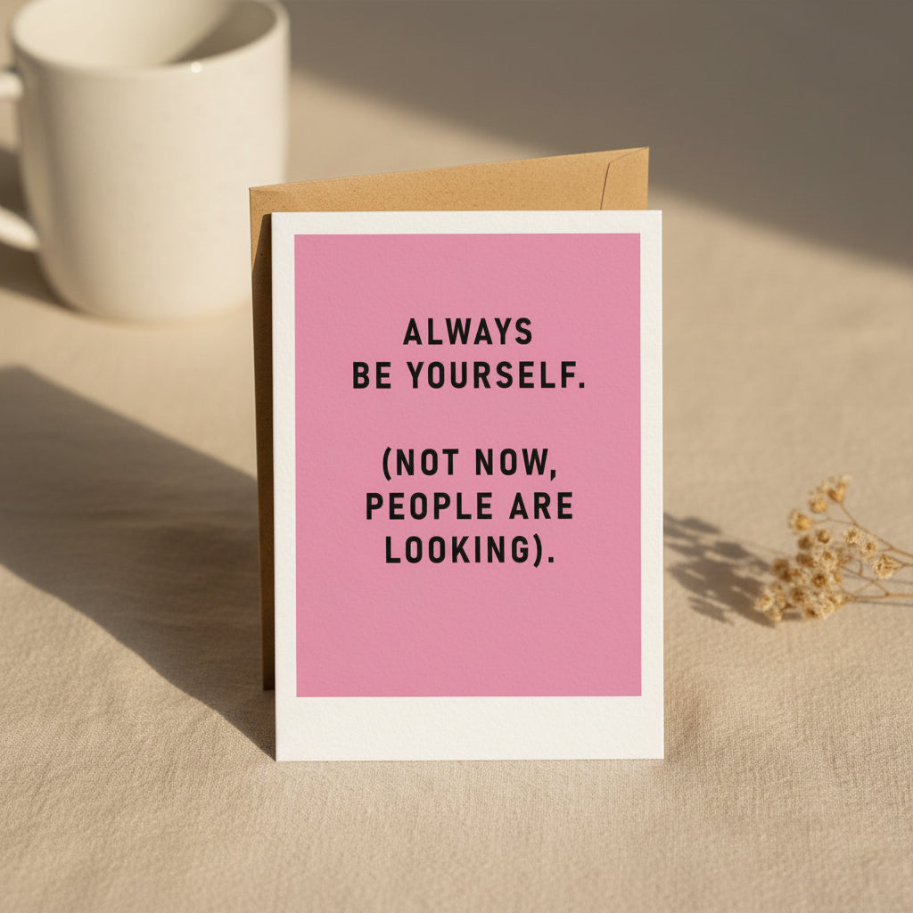Hot pink card panel with bold black capitals inside a white border