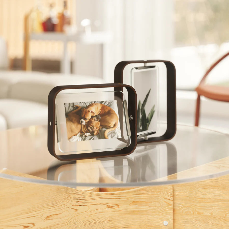 Umbra Bellwood picture frame in aged walnut displaying a photo on wooden surface