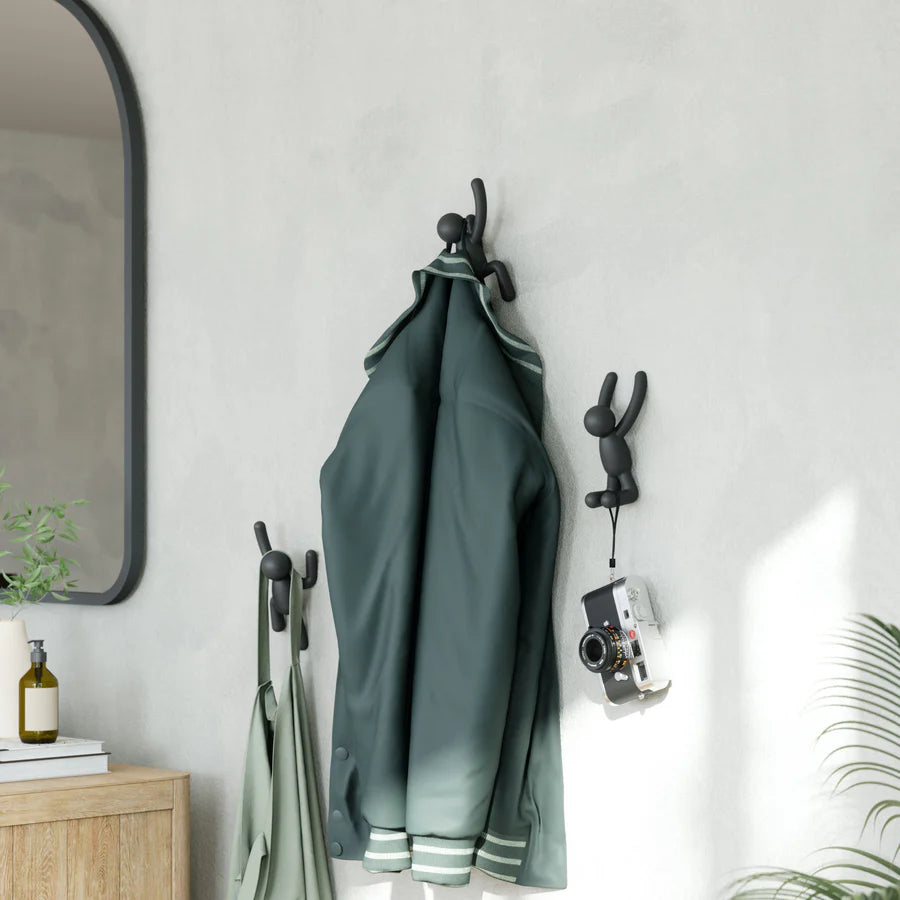 Buddy wall hooks black showing three different figurine poses
