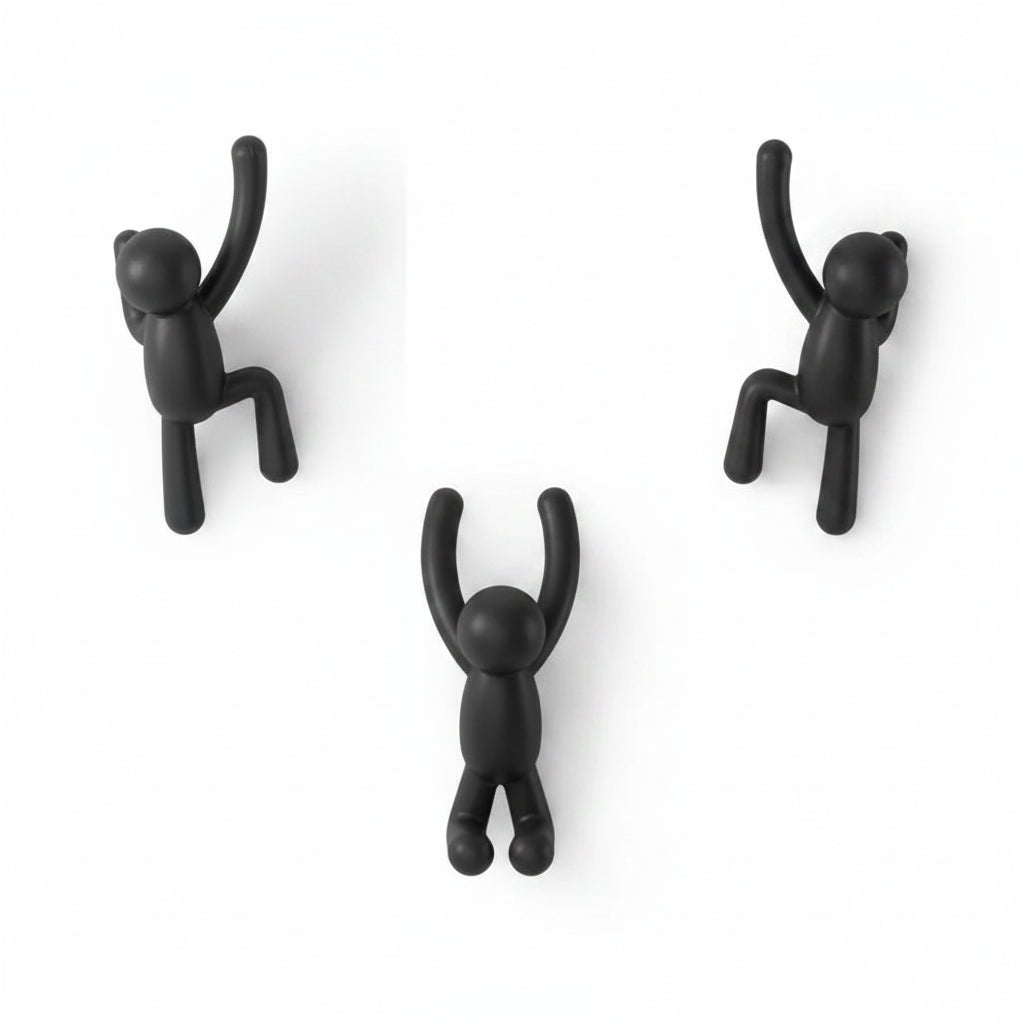 Buddy wall hooks black on white wall with scarves and keys hanging