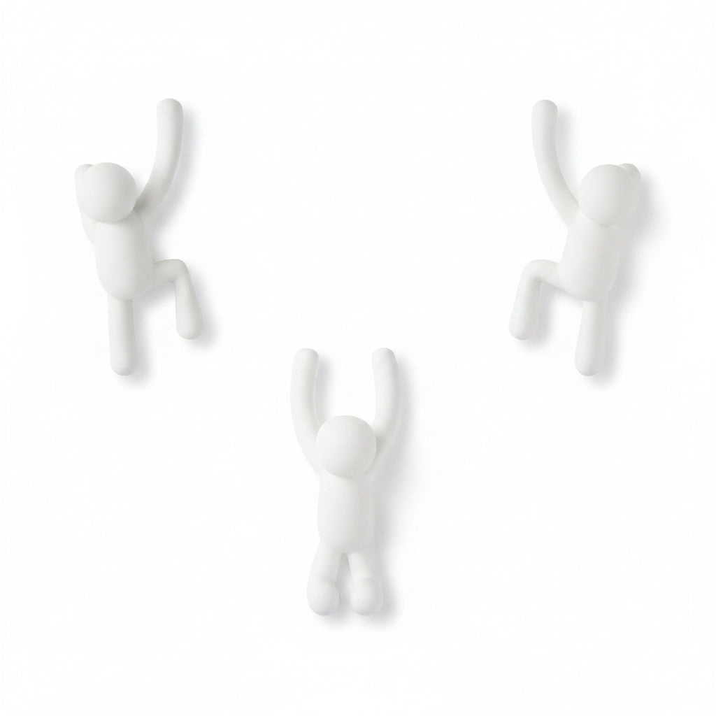 Buddy wall hooks white set close-up showing playful character detail