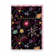 Black congratulations card covered in colourful hand-drawn fireworks and gold lettering