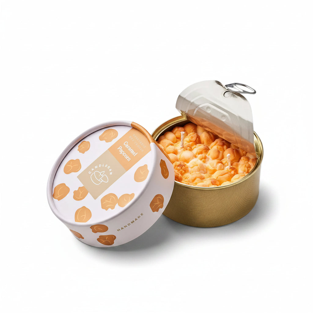 Caramel Popcorn candle in sealed tin with lid opened, showing ultra-realistic popcorn-shaped wax and stylish packaging design.