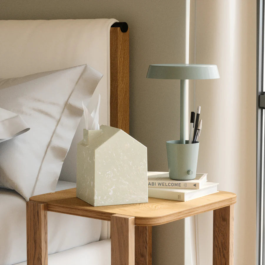 Umbra Casa Ocean sand tissue cover on bedside table with lamp