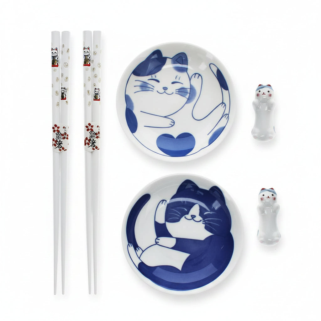 Cat noodle set complete flat lay showing bowls, chopsticks, and rests on white background
