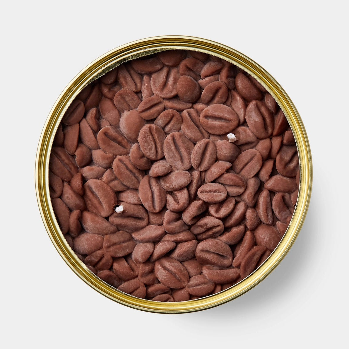 Close-up top view of the Coffee CandleCan showing textured, hyper-realistic wax coffee beans and two white wicks inside a metallic tin.