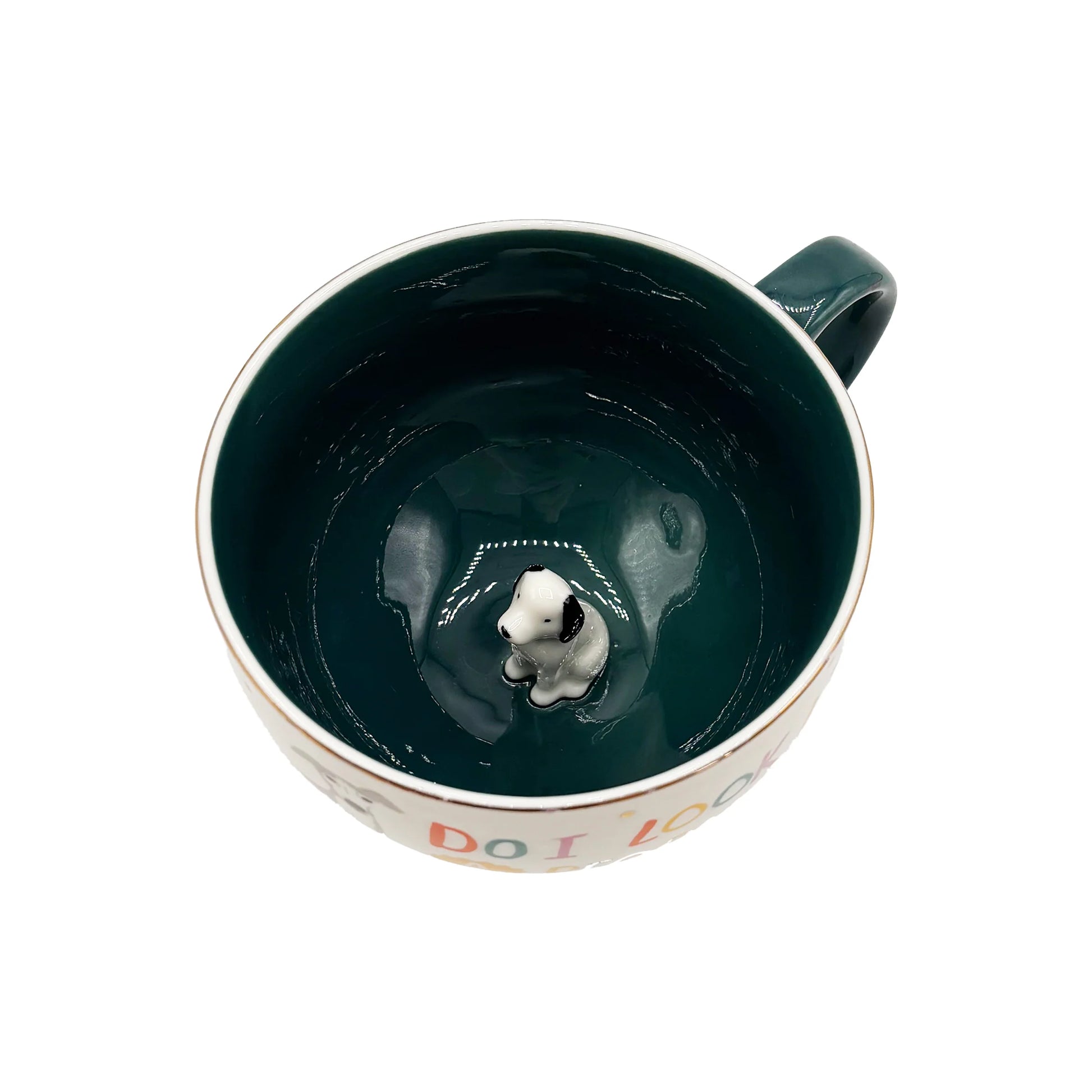 Top-down angle revealing 3D dog figure at base of mug.