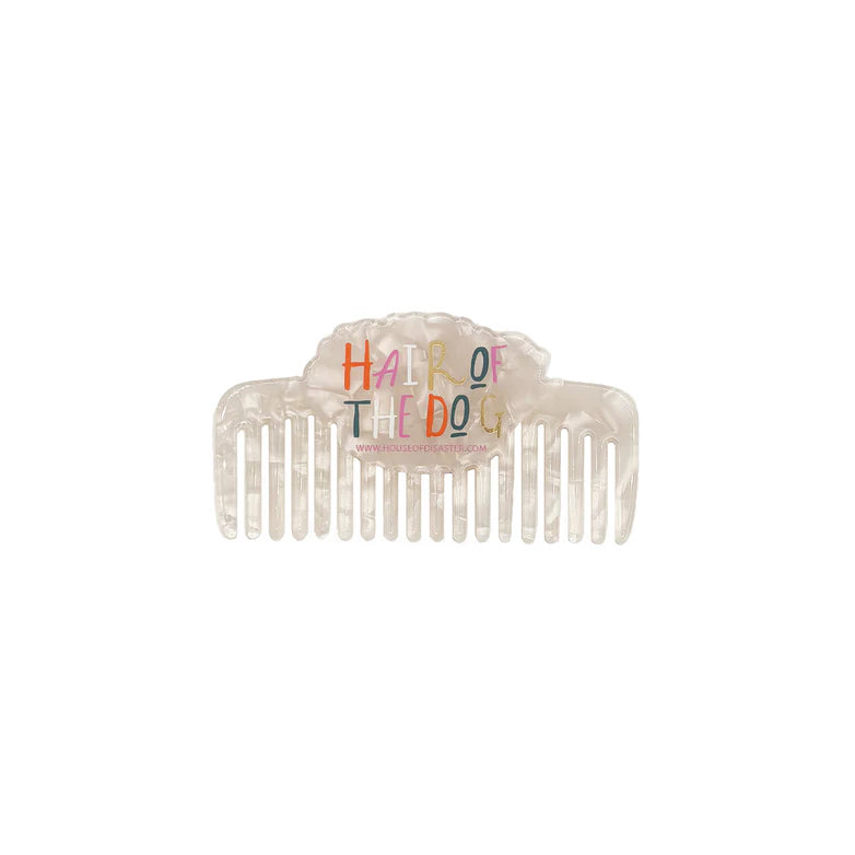 Product shot of pearlescent comb with ‘Hair of the Dog’ wording – Dog House Hair of the Dog Comb back view.