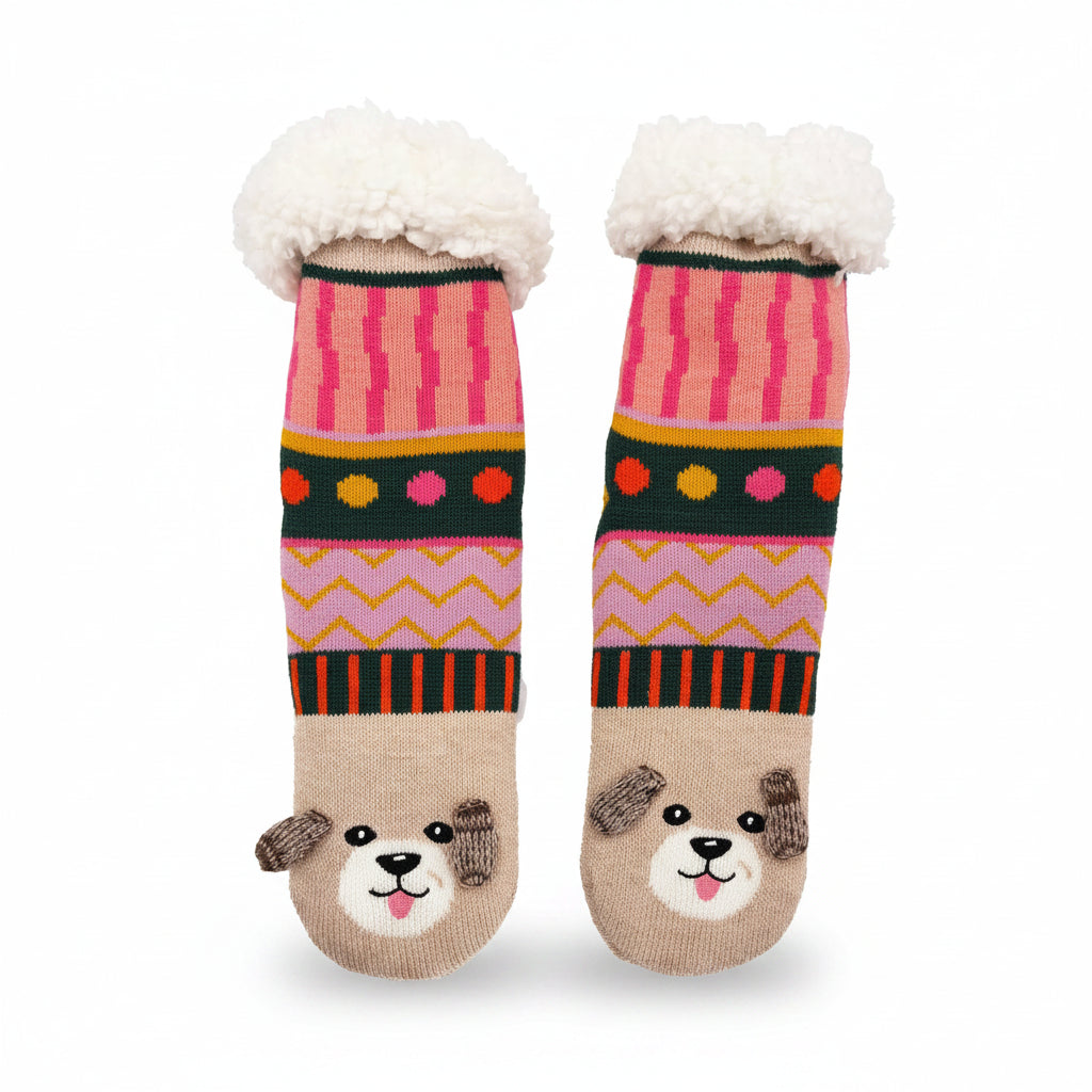 Flat lay of Dog House Slipper Socks with patterned design and white fleece cuffs.