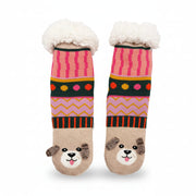 Flat lay of Dog House Slipper Socks with patterned design and white fleece cuffs.