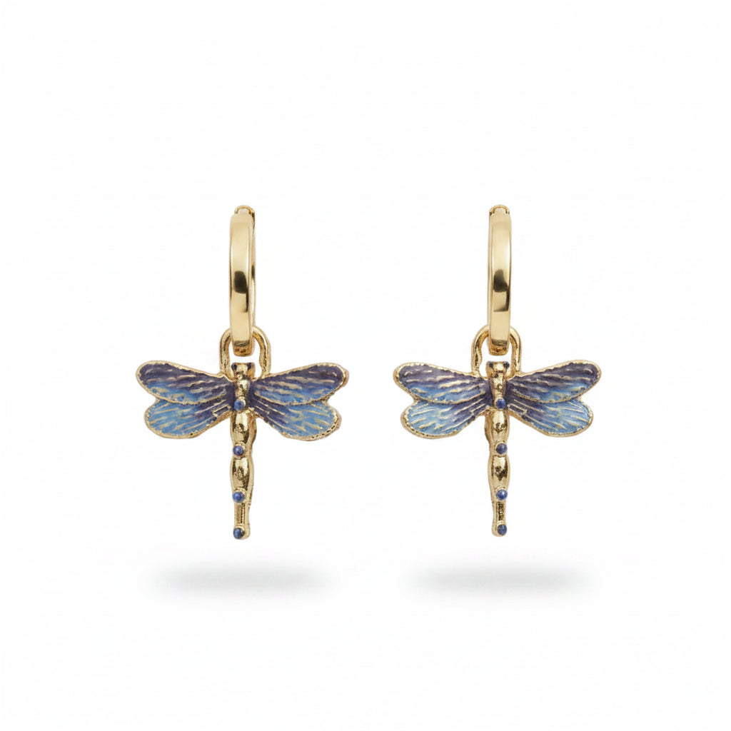 A pair of Fable England Dragonfly Crystal Earrings with blue enamel charms and gold-plated hoops on a white background.