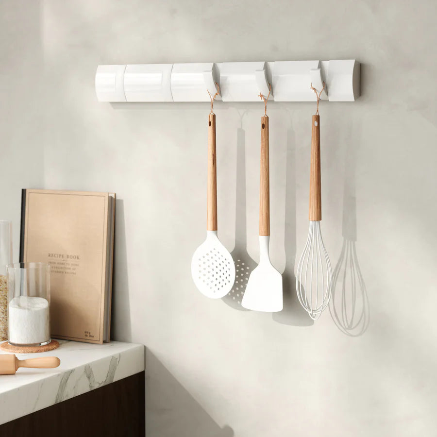Flip 5 hook white in entryway with coats and accessories hanging