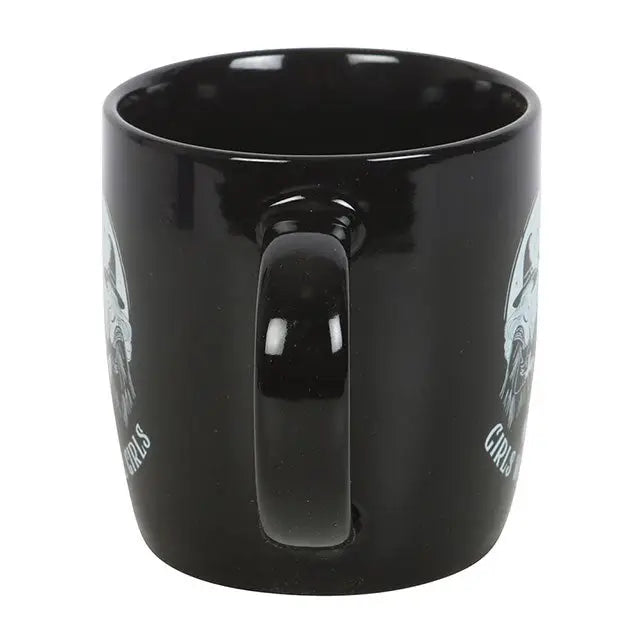 Back handle view of black witchy mug showing side designs of spell-casting witches.
