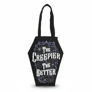 Full view of coffin-shaped black tote bag with gothic slogan and long handles, laid flat on a white background.