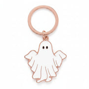Front of Groovy Ghost keyring featuring white enamel ghost charm with gold edges – fun and playful Halloween keychain