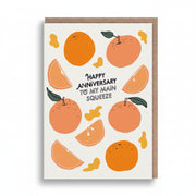 Cream anniversary card patterned with oranges and hand-lettered navy text