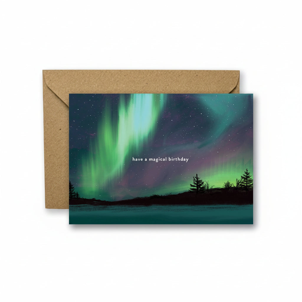 Happy Birthday Aurora card with kraft envelope flat lay presentation