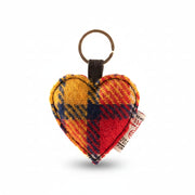Saffron tartan Harris Tweed heart keyring on white background