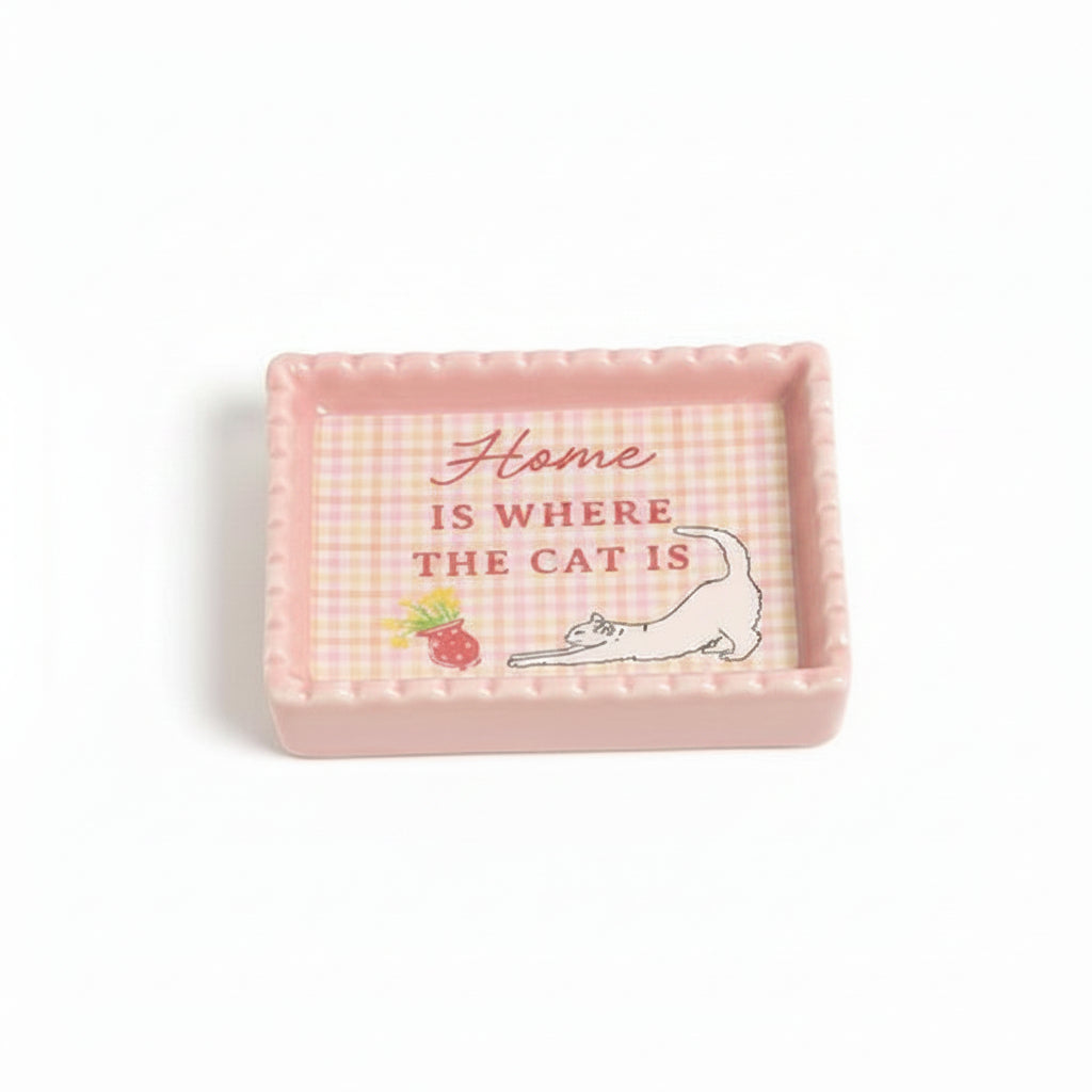 Pink gift box for “Home Is Where The Cat Is” trinket dish featuring cat illustration and gingham design.