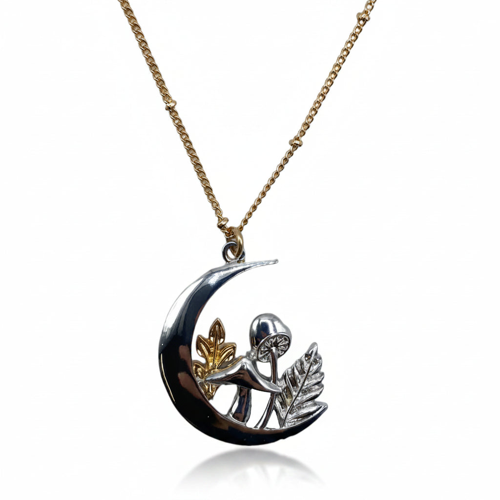 Studio shot of the Forage Moon Necklace with clear white background, showcasing silver crescent pendant and gold-tone chain in full detail.