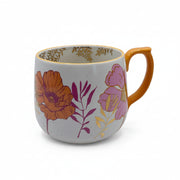 Front-facing image of Posy Orange Mug – floral ceramic cup with bold flower design and vibrant orange handle.