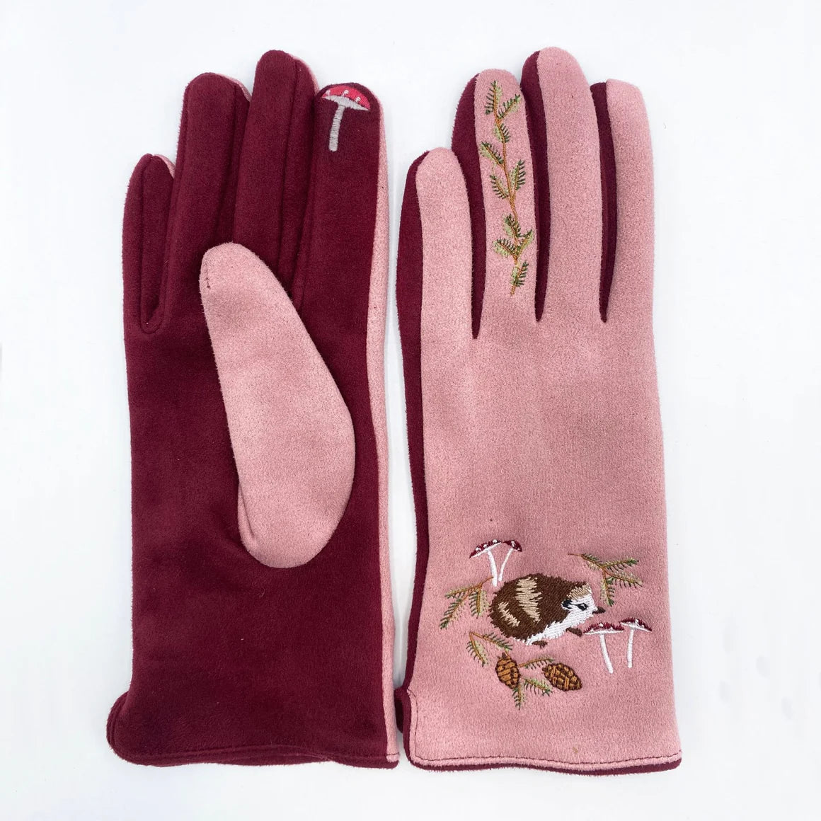 Back view of hedgehog gloves revealing soft grey palm-side fabric and thumb pads.