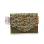 Front view of Islander Chestnut Herringbone Harris Tweed Card Holder with green leather base, classic tweed flap, metal crest, and official Harris Tweed tag.