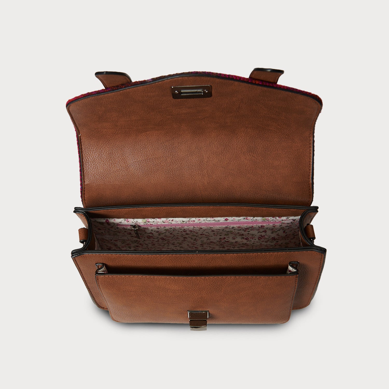 Interior view of Fuchsia Red Tartan Harris Tweed® satchel showing floral lining and compartments.