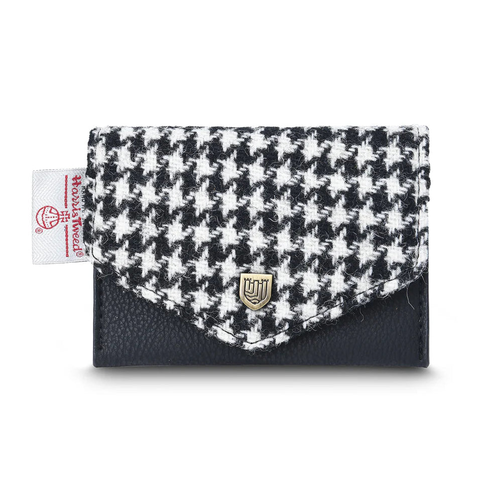 Black and white dogtooth Harris Tweed card holder with black trim on white background