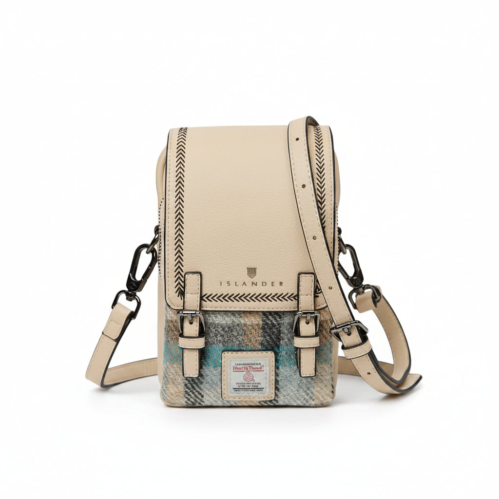 Islander Baby Jura crossbody bag face on, showing the Islander tartan Harris Tweed panel